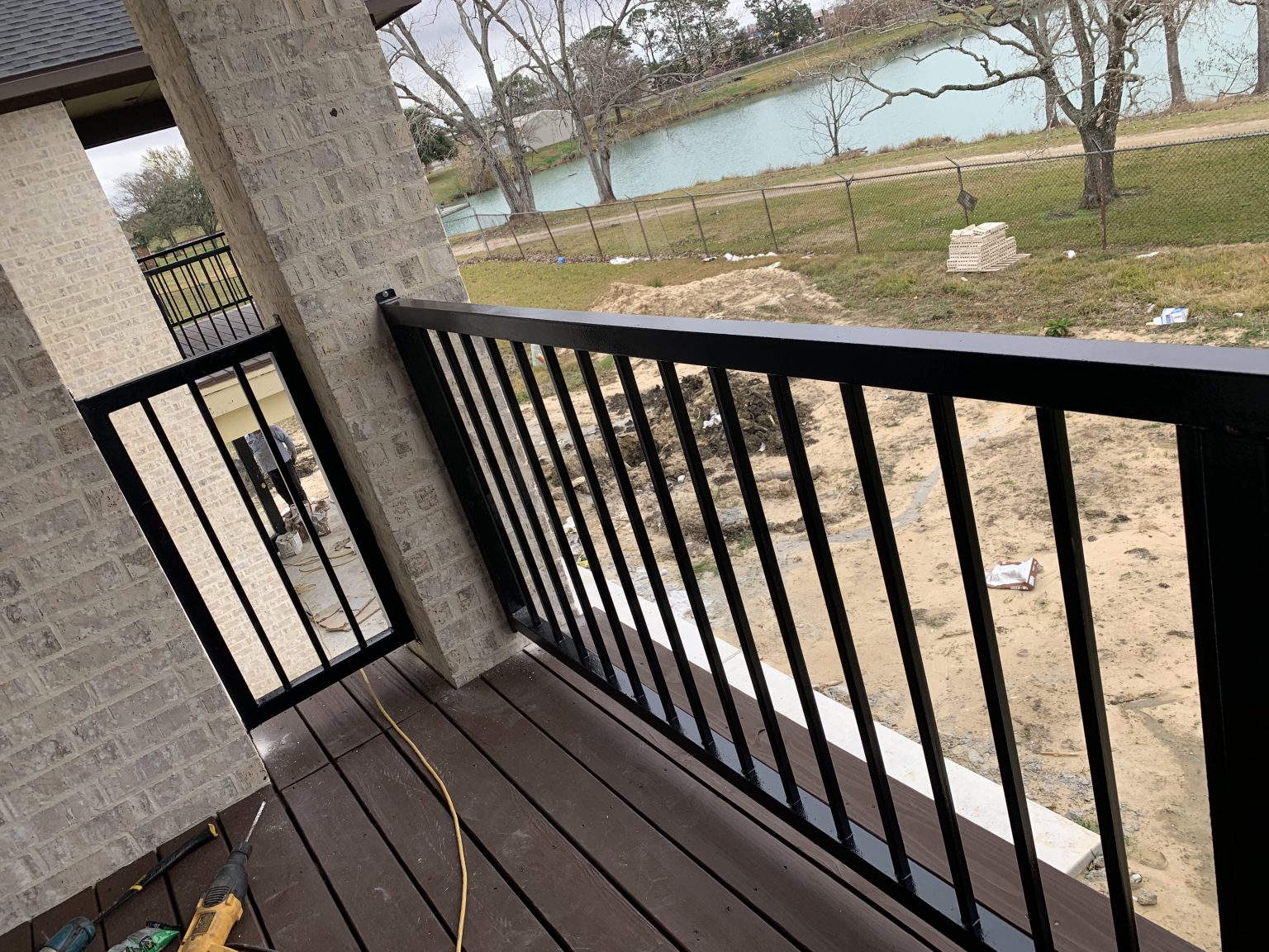 Commercial and residential metal railing systems for balconies, walkways, outdoor seating, and safety enclosures.