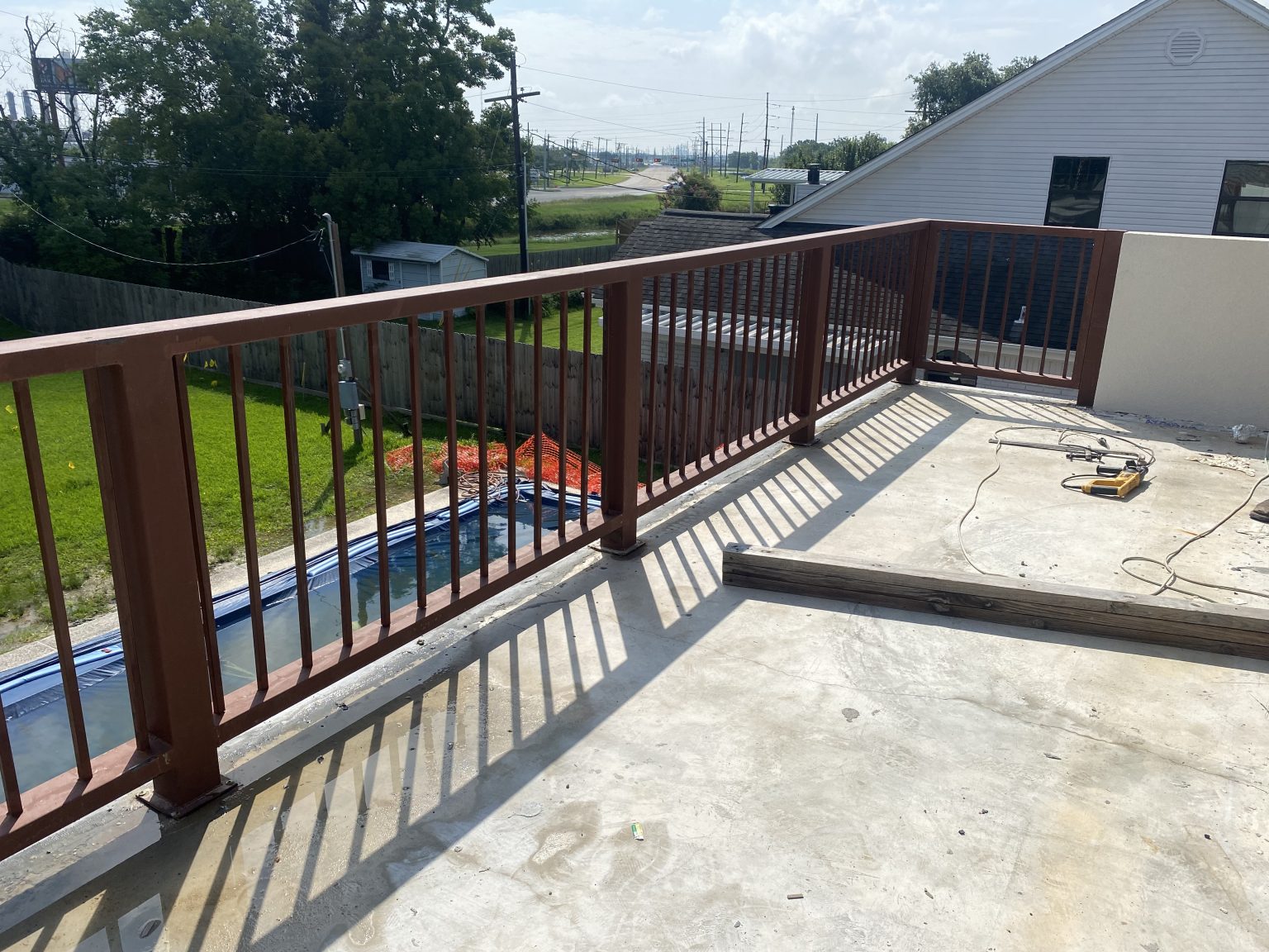 Commercial and residential metal railing systems for balconies, walkways, outdoor seating, and safety enclosures.